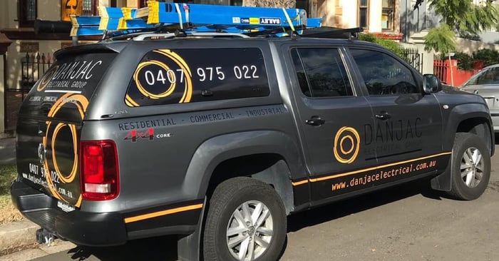 Danjac electrical ute with brand signage