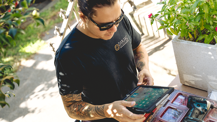 man working on device