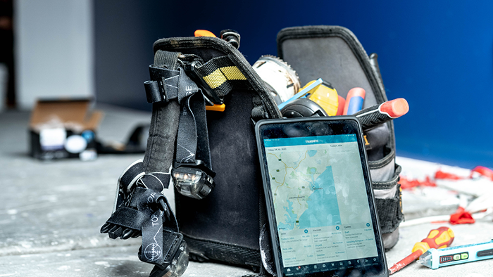 closeup of tool bag with tablet leaning against it