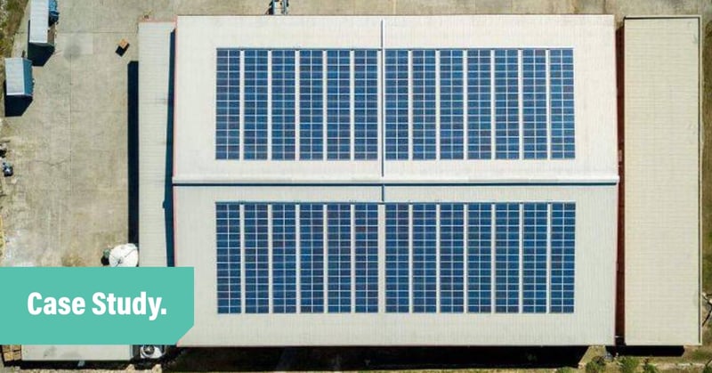 Aerial shot of a large solar panel with the words Case Study overlayed