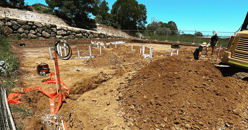 Case_Studies_GreenScapeXcavations_two men digging dirt trenches-1