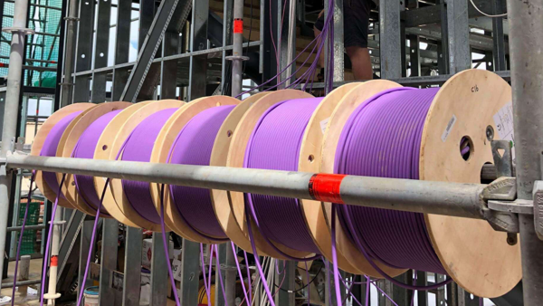 Casestudy_Lightning_Comms_data cable spools with purple cable