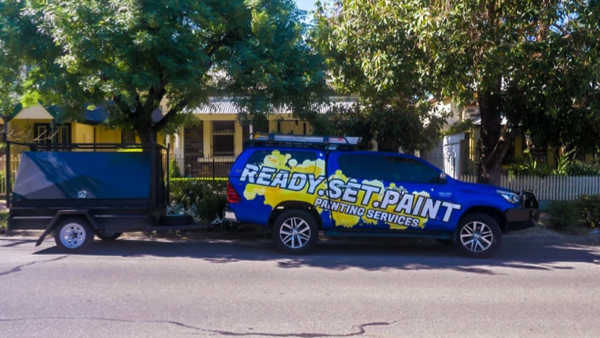 Customer Story_Ready Set Paint_Blue ute with ready set paint logo towing a trailer