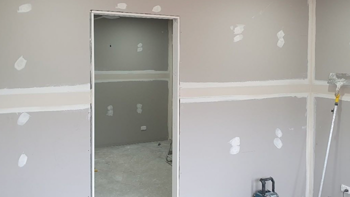 empty room with freshly plastered walls