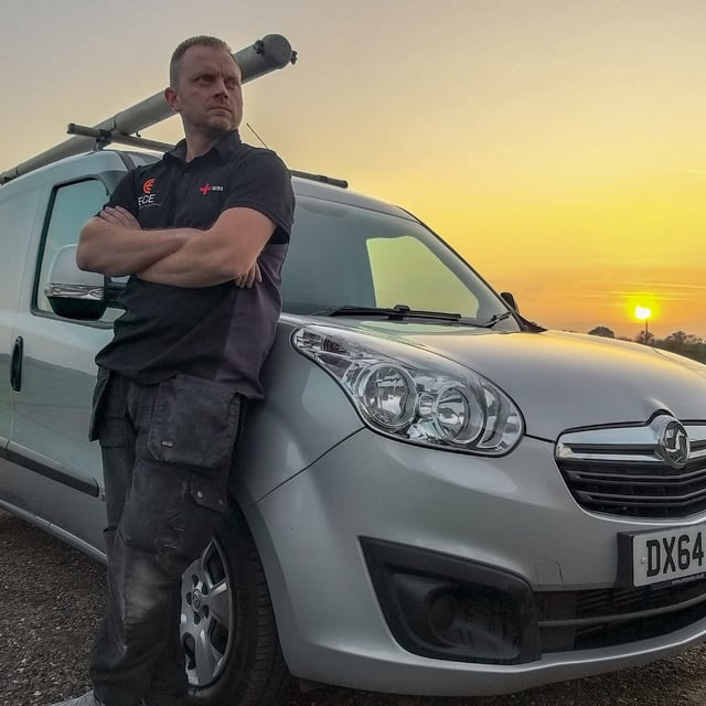 grant speller from Essex County Electrical leaning against his ute