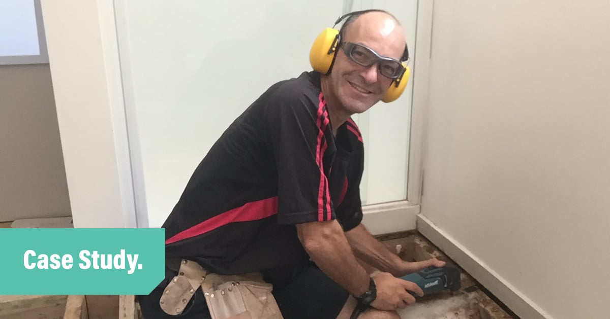 Customer story blog header with an a photo of Handy Andy wearking safety goggles and yellow ear muffs