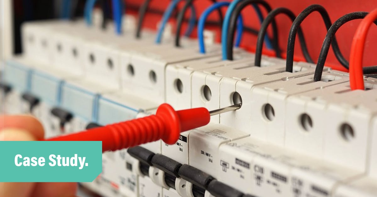 Customer story blog header photo of a tiny red screwdriver being used to work on a fuse board