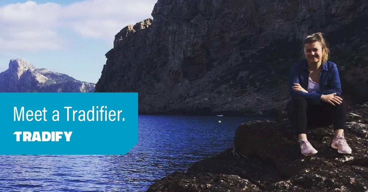 Meet a Tradifier heading with a photo of Charlie perched on a rock at the edge of water