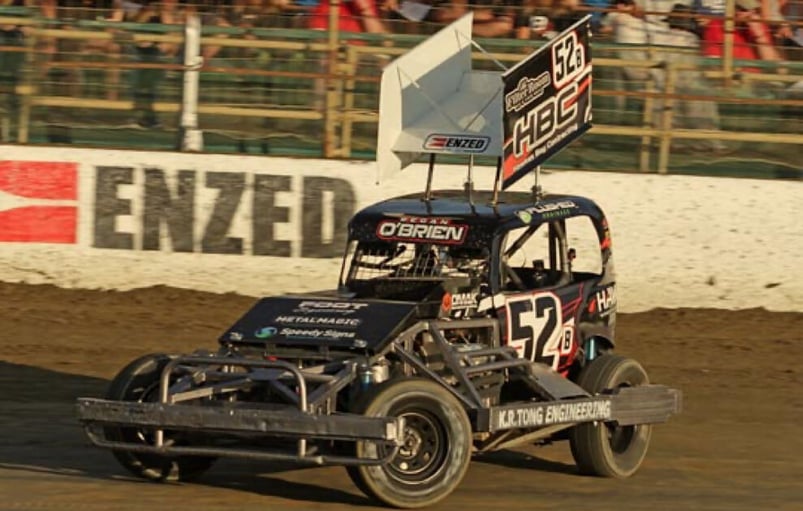 Regan O'Brien's black stock car number 52 on the race track