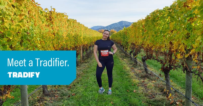 Odette stands in a vineyard, about to do a running race