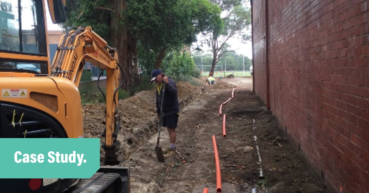 Richie's Electrical Tradify Case Study blod header with a photo of Richie laying cable in a trench