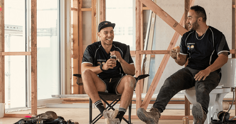 two builders having lunch