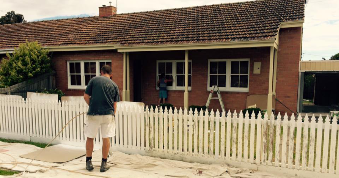master painters_painting a white picket fence