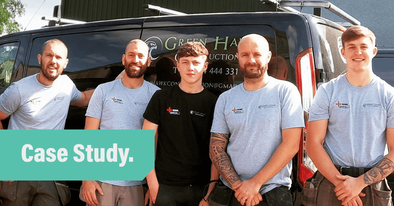 A photo of 5 members of the team at Green Hawk Construction