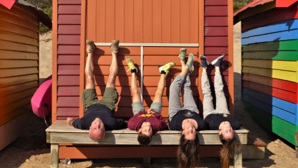 mat_marco_marco and his friends lying on a rainbow boathouse